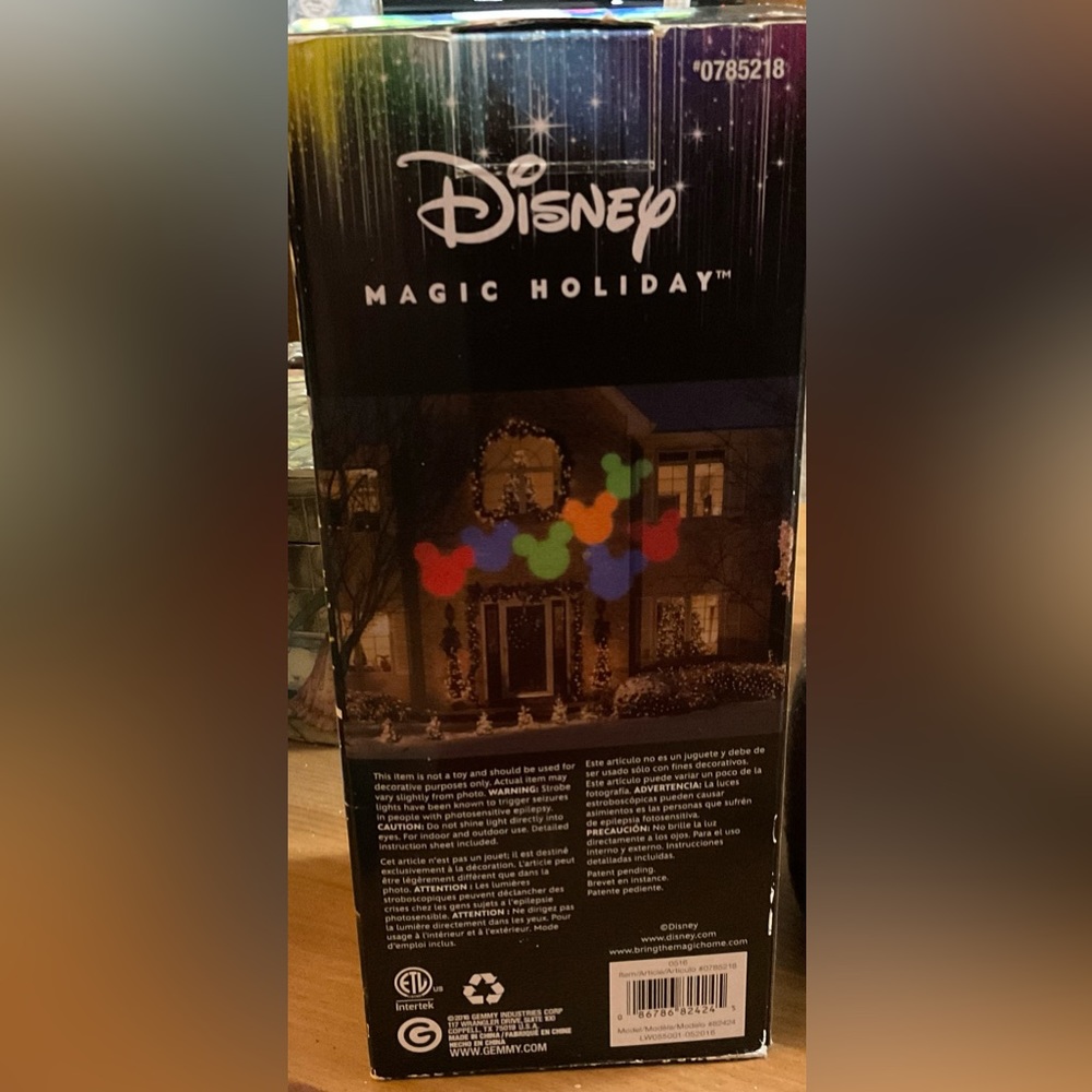 Disney: Mickey head projection reflector spotlight multicolor Mickey heads.